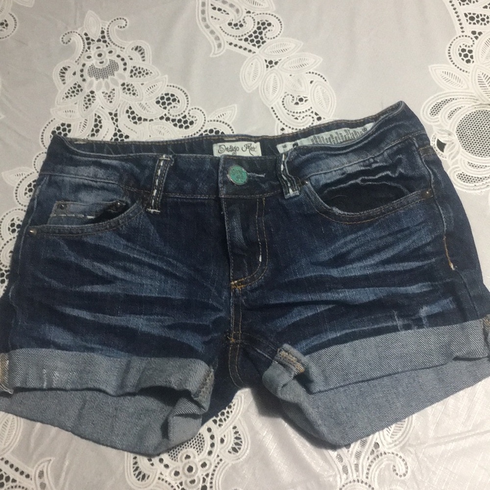 Dark blue rolled jean shorts